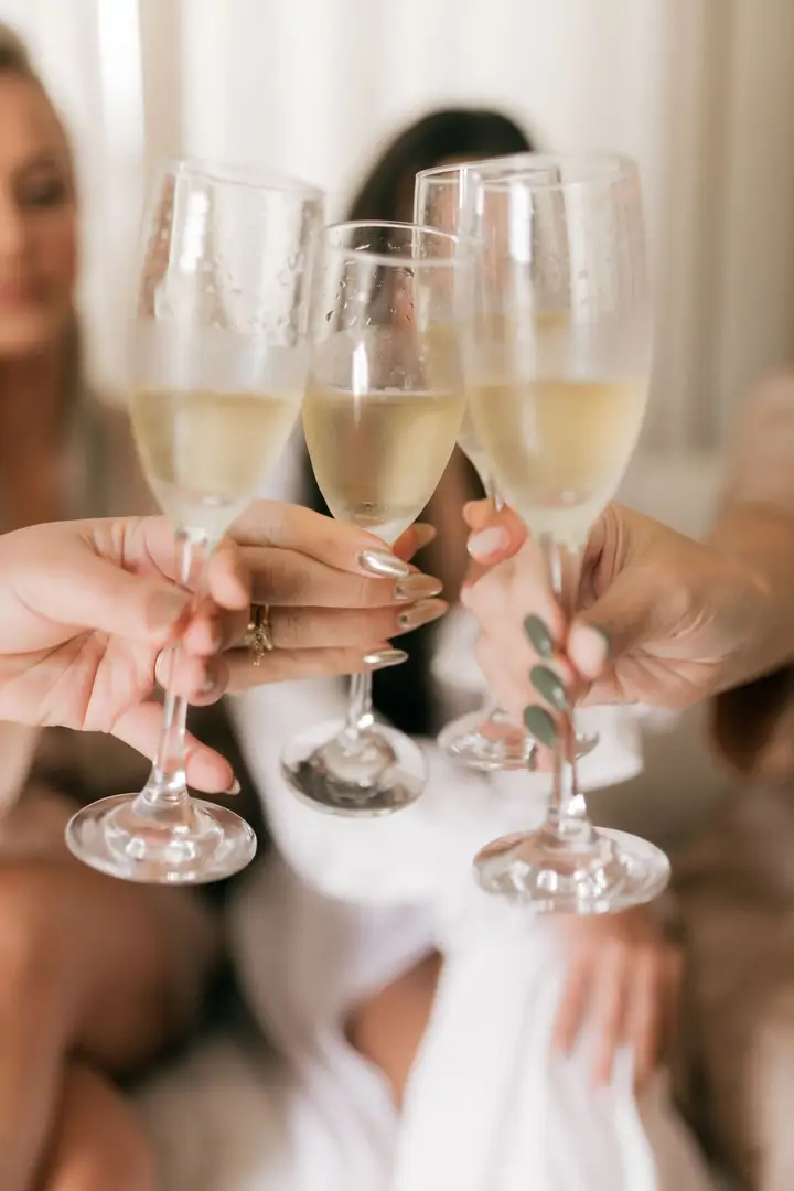 Guests raising a glass at a celebration