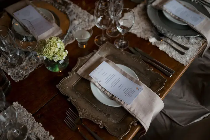 Tablescape with candles and greenery